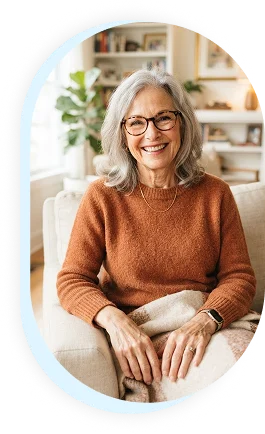 Senior woman smiling at home