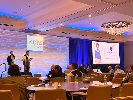 Conference attendees facing the stage at the CHS Annual Conference