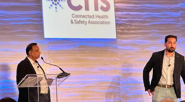 Speakers presenting on stage at the CHS Annual Conference