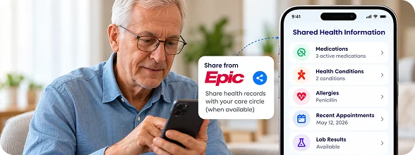 Senior man viewing shared wellness information on a smartphone