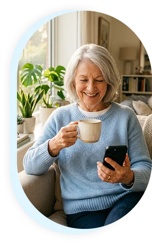 Senior woman using the mySeniorCareHub app at home